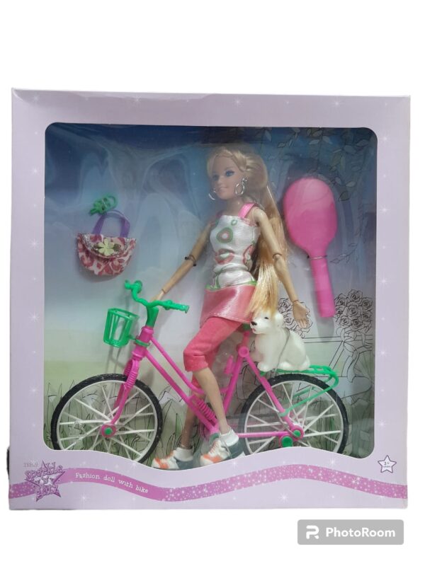 TESCO SPARKLE & GLITZ DOLL ON BIKE